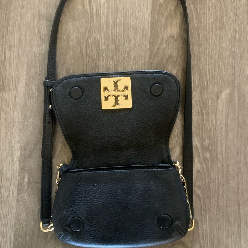 Tory Burch crossbody--very nice but emblem has slight wear.